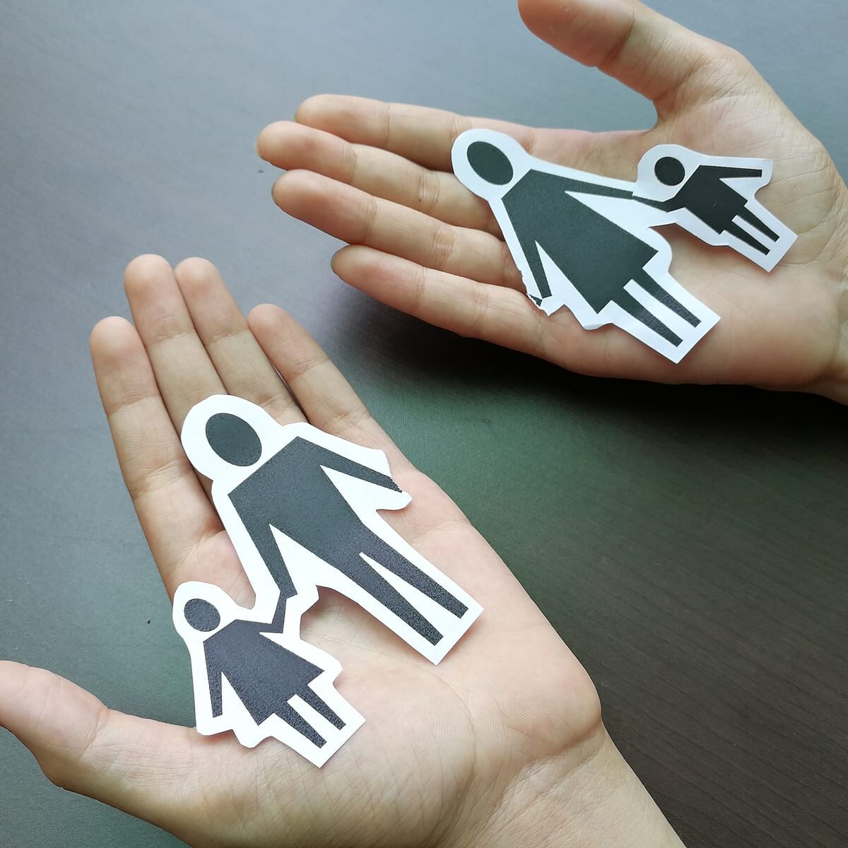 Cutouts of a woman and a child